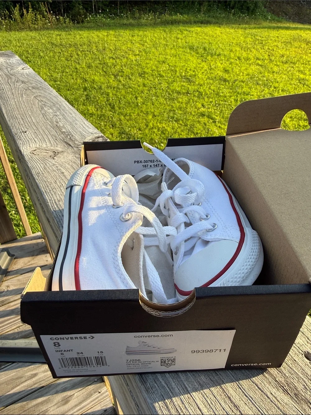 Converse White Low-Top Kids Sneakers with Red Trim